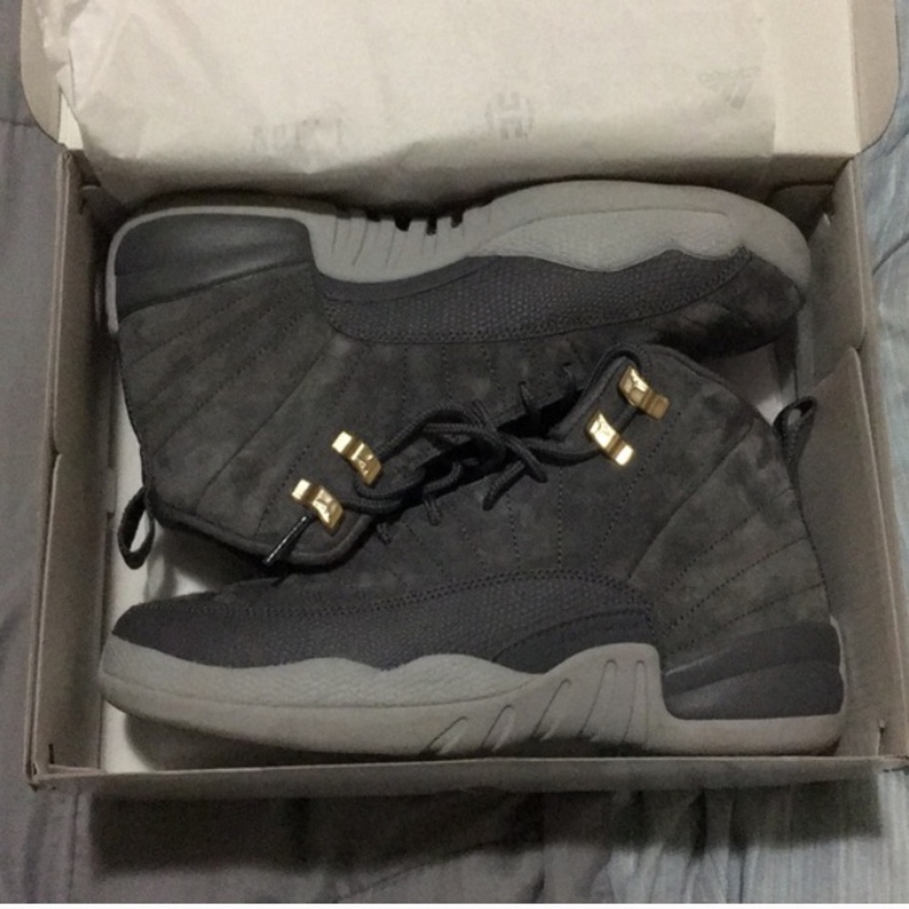 Dark grey Jordan 12 shoes